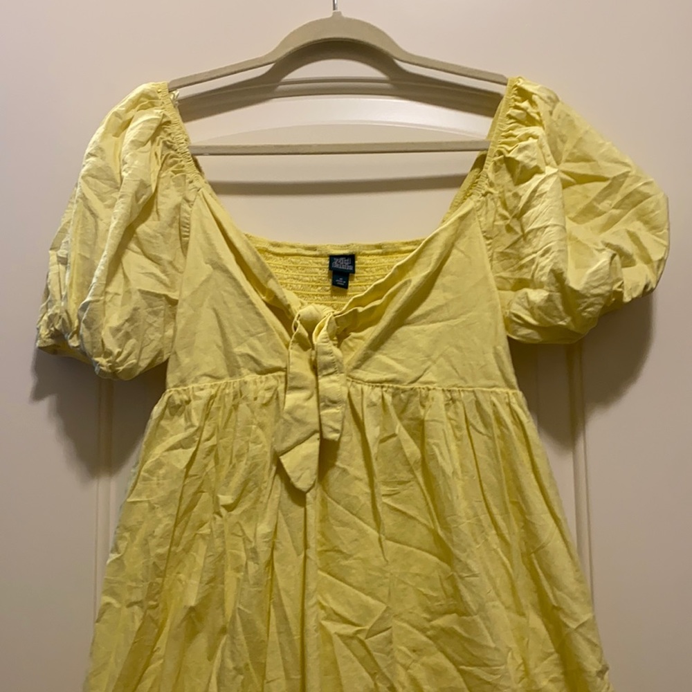 Bright yellow puff sleeve tie front dress